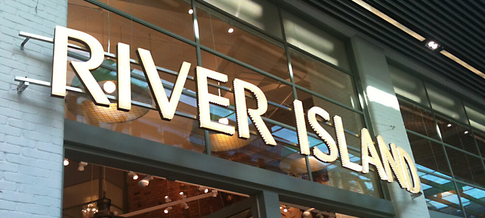 River Island exterior store illuminated shopfront